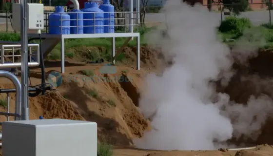 A modern power plant harnessing geothermal energy with steam rising from underground pipes, set in Miskolc, featuring clean energy infrastructure and natural geothermal vents, photorealistic detail, bright daylight, no text or symbols