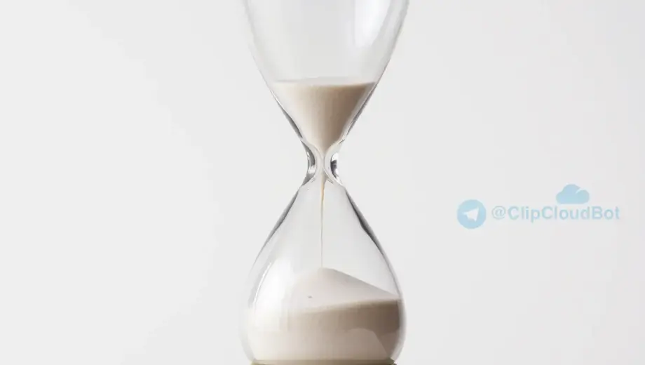 A single, clearly visible hourglass with sand flowing from the top bulb to the bottom bulb, centered in the frame, on a simple neutral background, representing the concept of something being visible only once