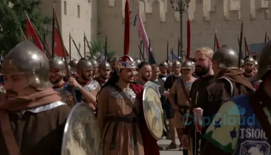 A realistic historical photograph depicting the liberation of Jerusalem during the First Crusade, showing medieval soldiers in period-accurate armor and clothing, stone city walls, banners, and a solemn atmosphere, with natural lighting and detailed textures