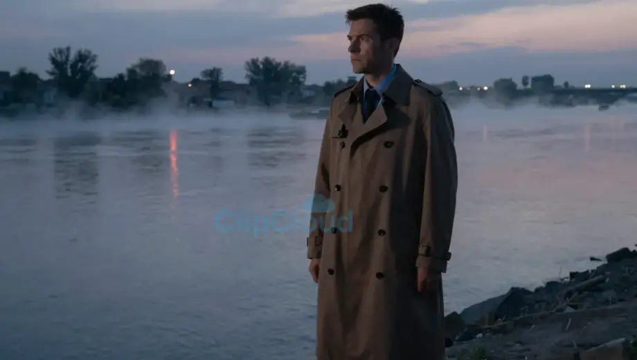 A detective in a trench coat stands on a riverbank at dusk, gazing at the Tisza River with a determined expression, subtle reflections of police lights on the water, atmospheric mist, cinematic lighting