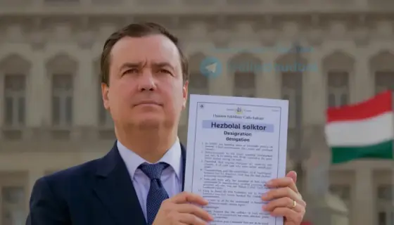 A realistic portrait of a political figure standing in front of a Hungarian parliament building, holding a document labeled 'Hezbollah terrorist designation', with a serious expression and Hungarian flag in background